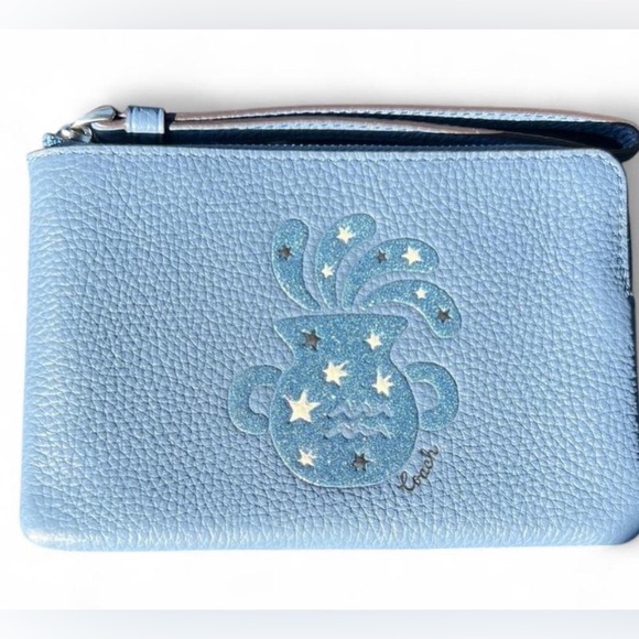 Coach Handbags - ✨ NWOT Coach Aquarius Zodiac Corner Zip Wristlet